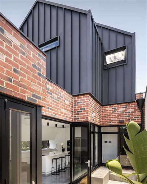 steel building with brick facade